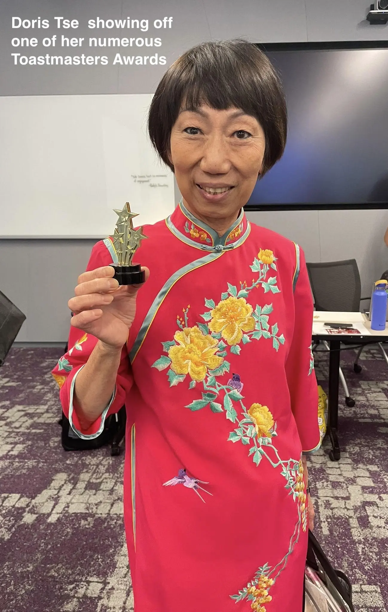 Our Leader Doris Tse 69FA showing off one of her numerous Toastmasters Awards Oct 21, 2023